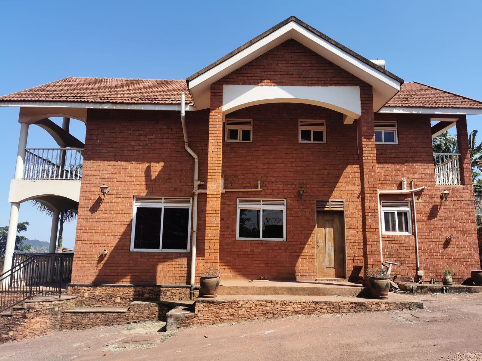 Completed two-storey brick residence with balcony
